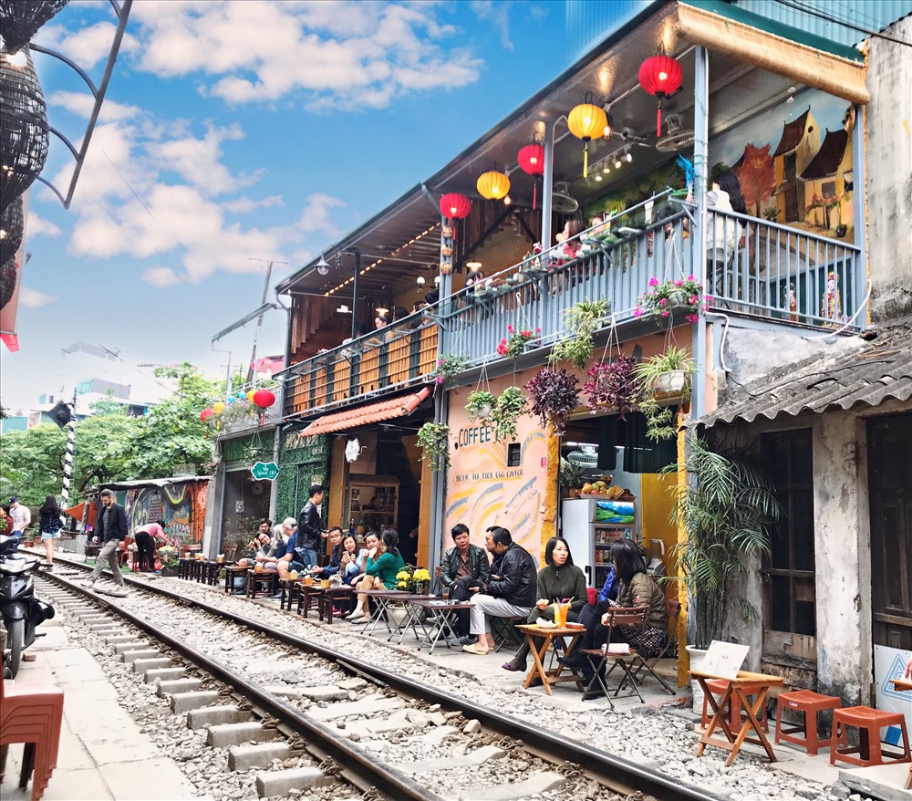 Beautiful life beside the Hanoi train railroad